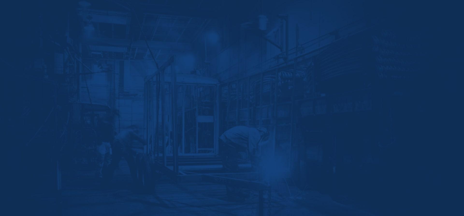 A dark blue tinted background image of two men building trailers.